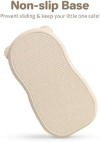 The non-slip textured bottom base of the Knirose baby diaper changing pad displayed clearly.