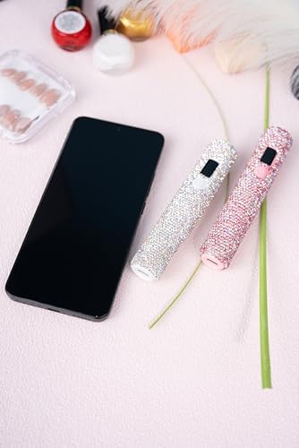 User holding Keeyada compact UV lamp for DIY manicure