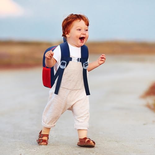 Child wearing dinosaur harness backpack outdoors