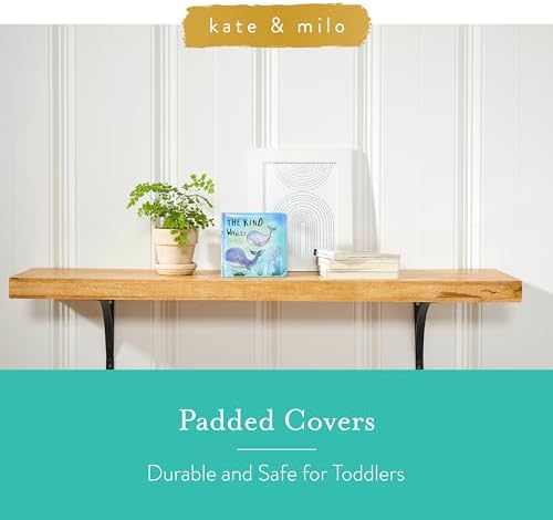 Toddler hands holding Kate & Milo Kind Whales book