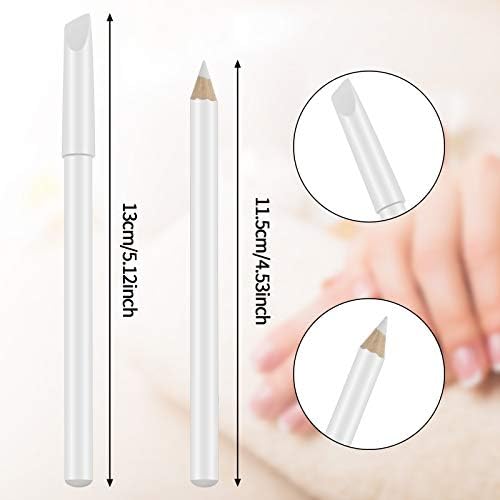 Maitys white nail pencil set spread out on a clean marble surface for home salon use.
