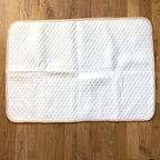 Tiny Undies waterproof pad in use during potty training