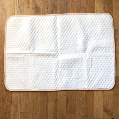 Tiny Undies waterproof pad in use during potty training