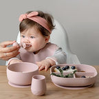 Close up of SAMiGO infant toddler utensils highlighting the built in choke stopper