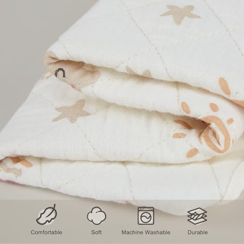 Detailed shot of the elasticized border and safety strap holes on the nursery sheet
