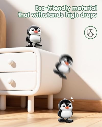 Humzo clockwork surprise egg popped open displaying the cute walking penguin toy mechanism.