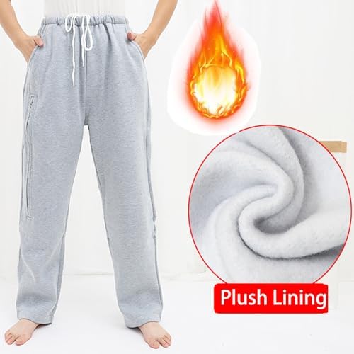 Zippered pocket detail showing hidden urine bag storage on catheter pants