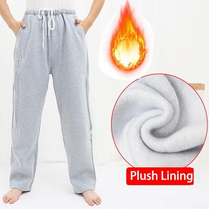 Zippered pocket detail showing hidden urine bag storage on catheter pants