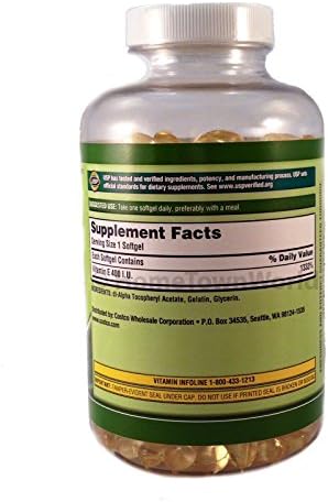 Pile of golden Kirkland Signature Vitamin E softgel capsules