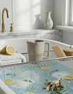 Side angle of the taupe Roslim baby bath cup highlighting the flexible silicone body.