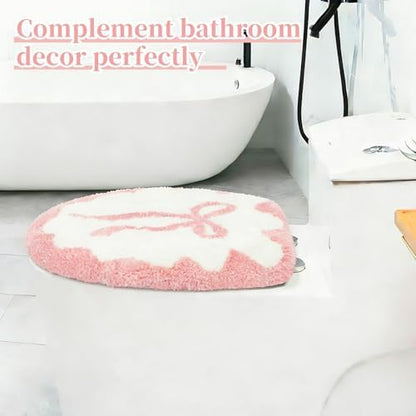Side view of the thick cushioned pink bow pattern restroom mat for modern homes.