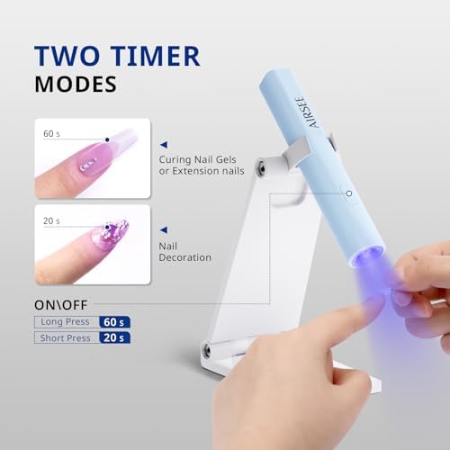 AIRSEE mini gel nail dryer being charged via USB cable on a desktop setup