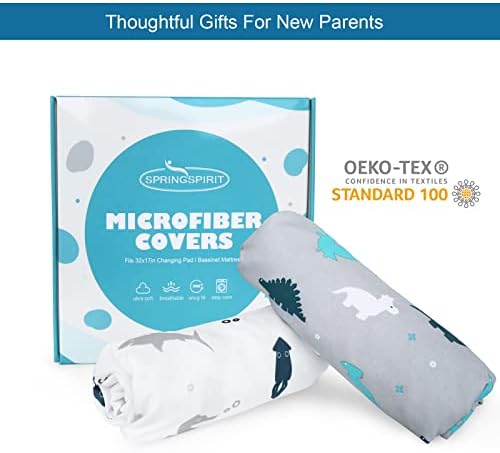 Two pack set of Springspirit baby diaper changing sheets neatly folded to display both playful patterns.