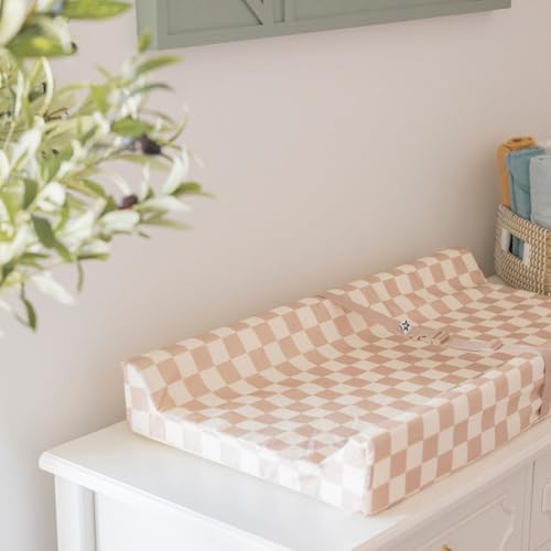 Tiny Twinkle changing pad showing waterproof wipeable surface