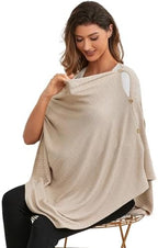 Zdolmy nursing cover used as cozy baby swaddle