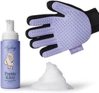 No-rinse pet dry shampoo foam being applied with purple silicone glove on cat fur.