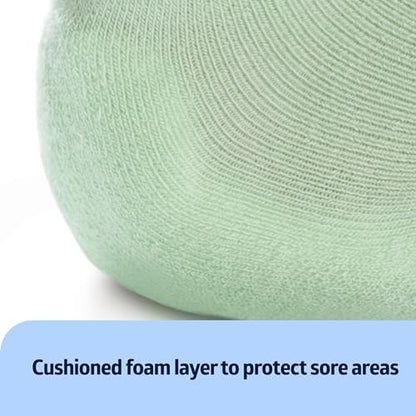 One pair of green Medline protectors displayed to show machine washable texture.