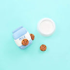 ZippyPaws Milk and Cookies pet enrichment plush puzzle demonstrating how to insert squeaky toys.