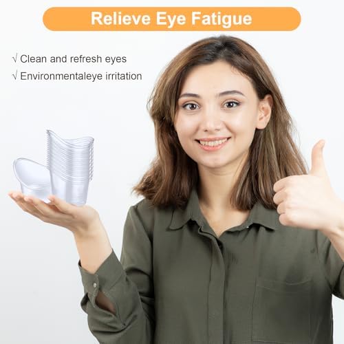 Close up of clear PVC disposable measuring cups for eye drops