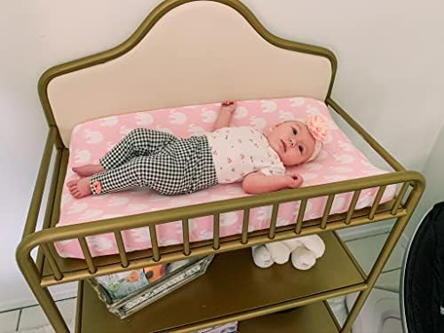 Four pack of authentic USA imported pink baby girl changing table sheets neatly folded together