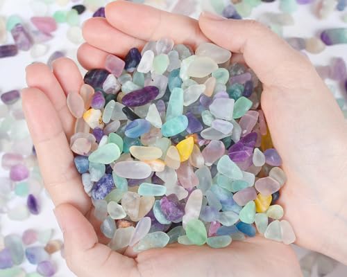 Close up shot showing the natural purple and green texture of Qinjiejie fluorite chips.