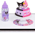 Assembling a miniature Hello Kitty themed terrarium using craft resin and tweezers