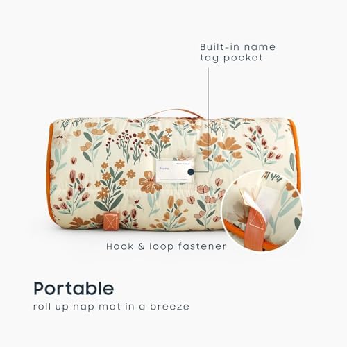 Wake In Cloud floral toddler sleeping mat rolled up and secured with hook and loop fasteners and carrying handle