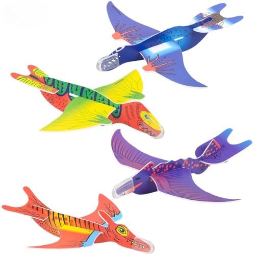 Assorted colorful foam dinosaur flying gliders assembled and ready for outdoor playtime.