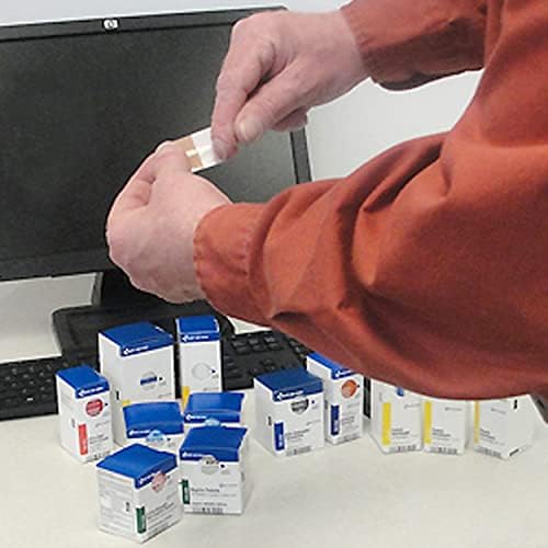 Close up of First Aid Only 237 piece emergency medical supplies.