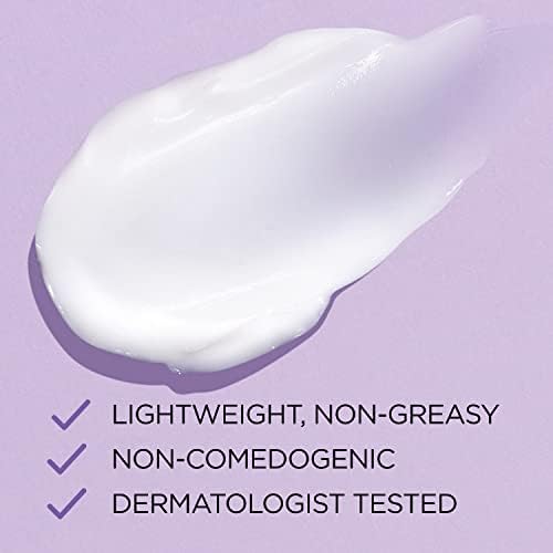 L'Oreal Paris skincare moisturizer jar with lid off demonstrating rich creamy consistency