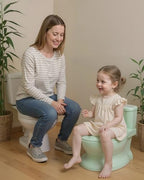 Side profile of PipNest training toilet featuring wipes storage tank