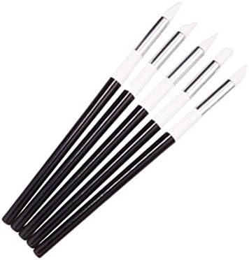 Hand holding Minkissy nail art corrector tool for manicure