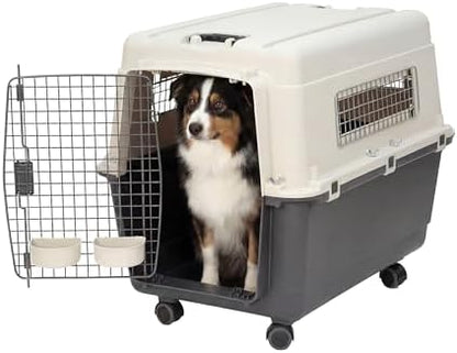 Sport Pet thirty one point five inch pet crate with attached food bowls and live animal stickers