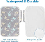 Foldable diaper changing pad attached securely to a stroller handle during an outing