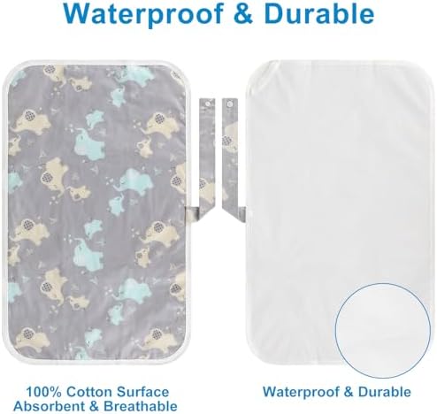 Foldable diaper changing pad attached securely to a stroller handle during an outing