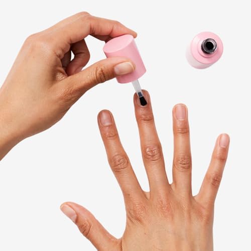 Olive and June plant powered vegan nail strengthener showing applicator brush