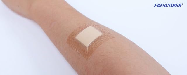 Two pack of FRESINIDER hypoallergenic pink silicone adhesive tape for sensitive wound protection.