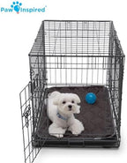 Paw Inspired absorbent dog cage liner protecting wood flooring from pet liquid accidents.