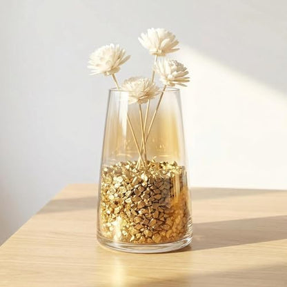 Gold crushed glass used as texture in a resin art project