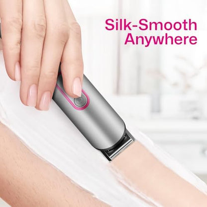 Waterproof electric razor for women being rinsed under running water to demonstrate wet and dry functionality.