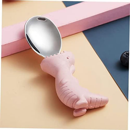 Pink silicone dinosaur handles on toddler stainless steel cutlery set close up