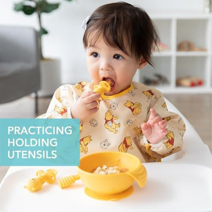 Close up of Bumkins silicone baby training utensils with sensory bumps