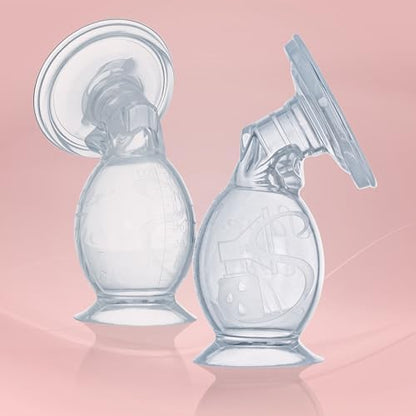 Save The Milk manual breast pump being cleaned with the included long-handled cleaning brush.