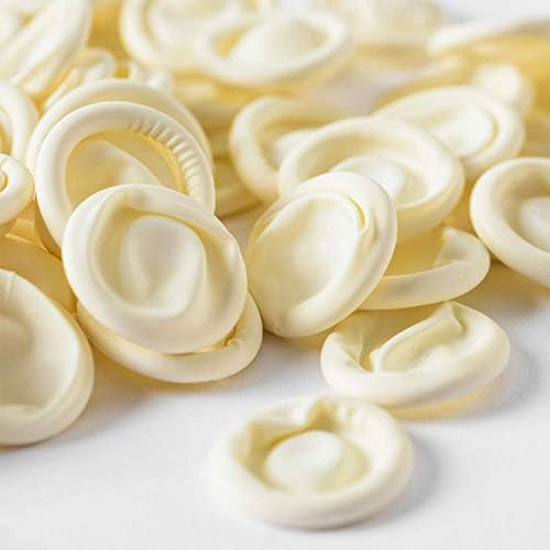 White disposable 4 Mil thick finger sleeves spread out on a clean workbench