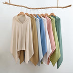 Tado Muslin multi-use nursing cover used as stroller shade