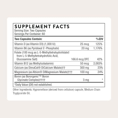 Side angle view of Thorne Advanced Bone Support bottle displaying detailed supplement facts and dicalcium malate ingredients