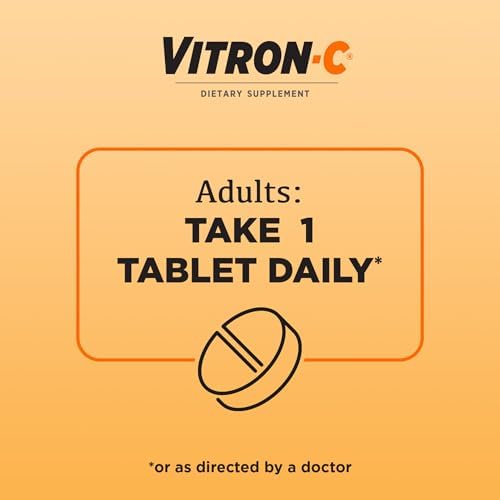 Close-up of Vitron-C vegan gluten-free coated tablets for energy and immunity.