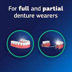 Denture adhesive cream food seal blocking particles from getting under partial dentures