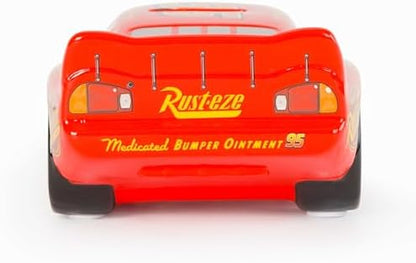 Jay Franco Lightning McQueen racecar bank styled as decorative storage on a child bedroom shelf