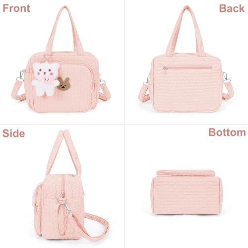 Lushandy pink diaper bag showing shoulder strap and plush pendant